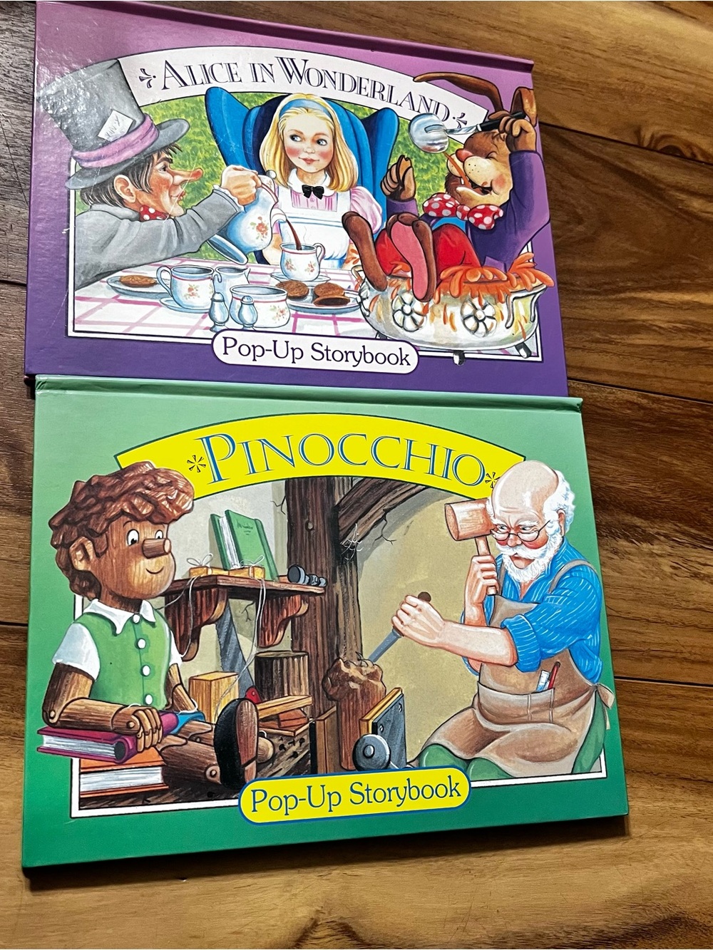 Pinocchio and Alice In Wonderland pop up books
